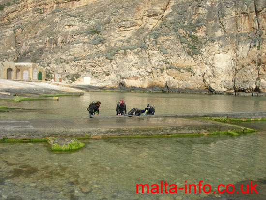 Group of divers on the jetty